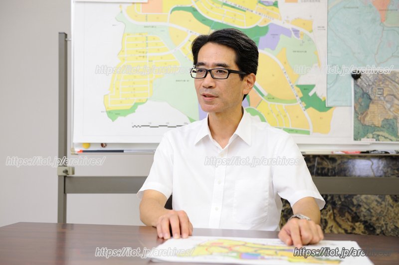 事業について説明する山崎さん